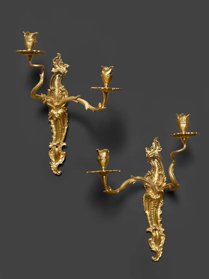 A paire of early Louis XV ormolu two-light wall-lights